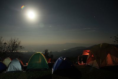 Tent on field against sky