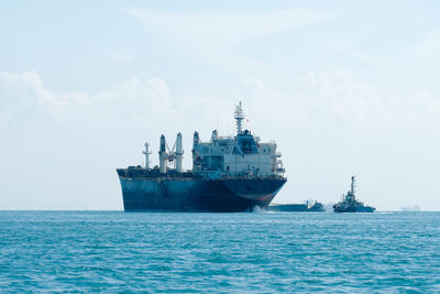 Ship in sea against sky