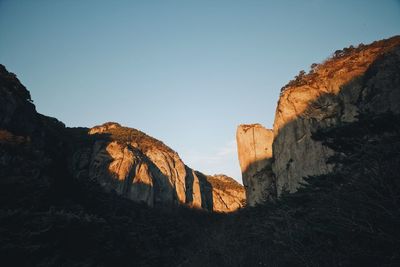 Low angle view of rock formations