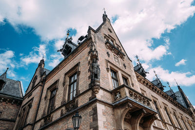 Low angle view of historic building against sky