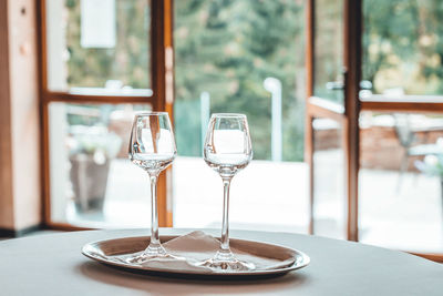 Wineglasses on table in restaurant