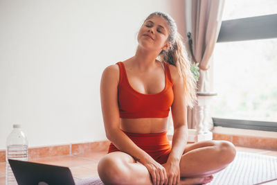 Young woman using mobile phone