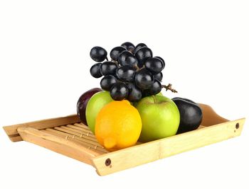 Close-up of fruits against white background