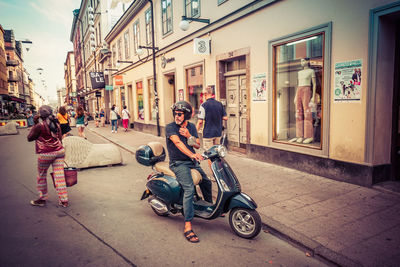 People on street in city