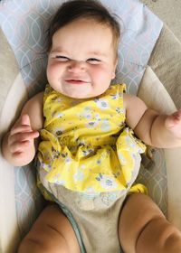 Portrait of cute happy baby girl smiling