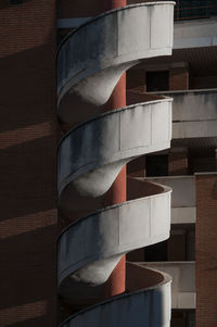 Spiral staircase against building