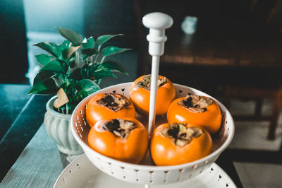 High angle view of persimmons fruit on table