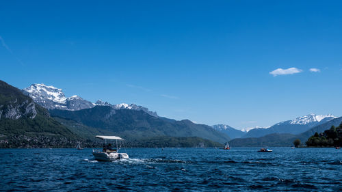 Boats sailing in sea