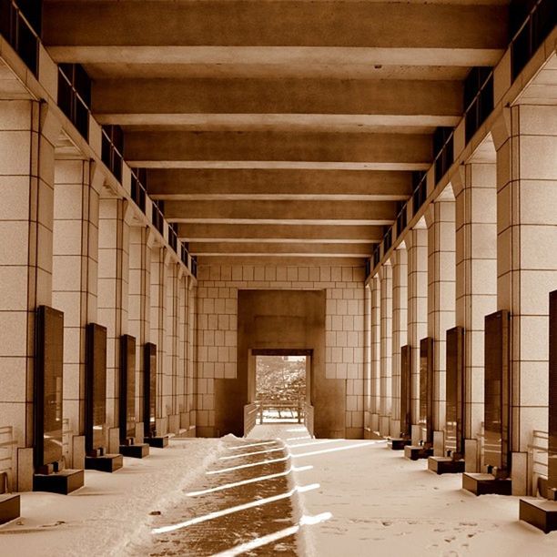 architecture, indoors, the way forward, built structure, corridor, diminishing perspective, ceiling, empty, vanishing point, architectural column, in a row, flooring, column, long, absence, building, narrow, colonnade, walkway, no people