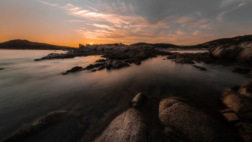 Scenic view of sea against sky during sunset