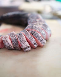 Raw fish caught in the hand of the fisherman