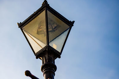 Low angle view of street light against clear sky