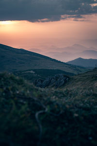 Scenic view of landscape against sky during sunset