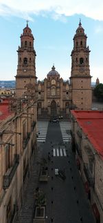 View of historic building against sky in city