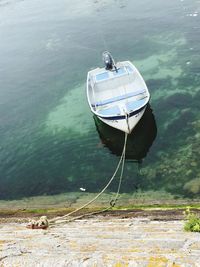 Boat moored on sea