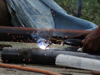 Man working on metal