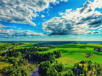 Scenic view of landscape against cloudy sky