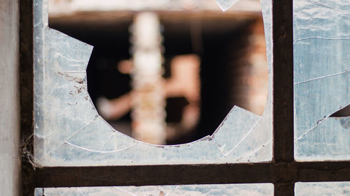 Close-up of rusty metal window