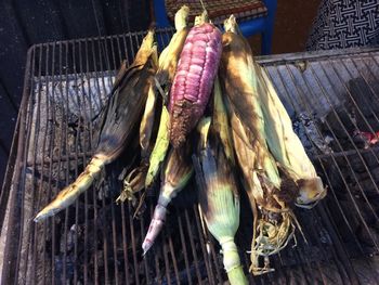 High angle view of corn on barbeque