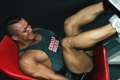 High angle view of young man exercising in gym