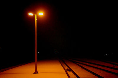 Illuminated street light at night