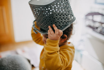Portrait of child holding basket