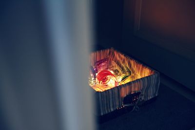 Glasses in illuminated box at home