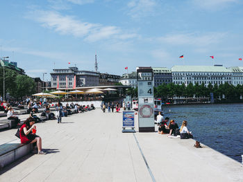Group of people in front of buildings