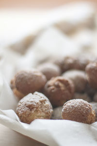 High angle close-up of sweet food on tissue paper