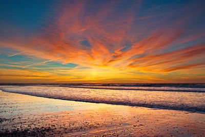 Scenic view of sea against sky during sunset