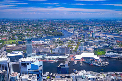 High angle view of river amidst buildings in city