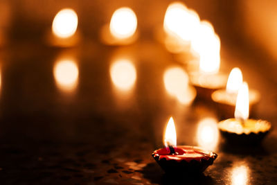 Close-up of burning candles