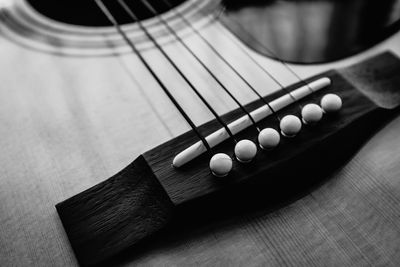 High angle view of guitar on table