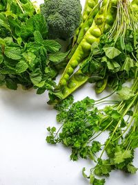 Directly above shot of vegetables on white background