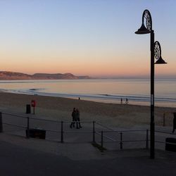 Scenic view of sea at sunset