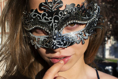 Portrait of beautiful woman wearing mask