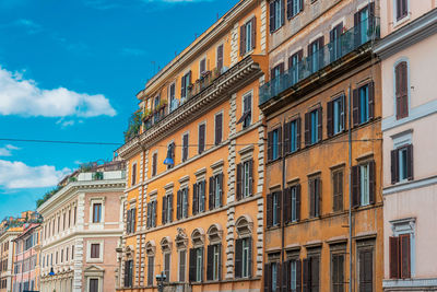 Low angle view of residential buildings against sky