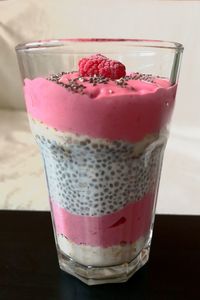 Close-up of strawberry fruit in glass on table