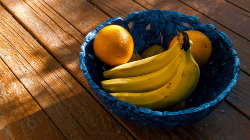 High angle view of fruits in bowl on table