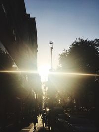 Silhouette of people at sunset