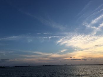 Scenic view of sea at sunset