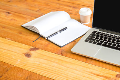 High angle view of mobile phone on table
