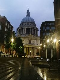 Illuminated city against sky