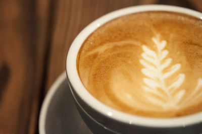 Close-up of cappuccino on table