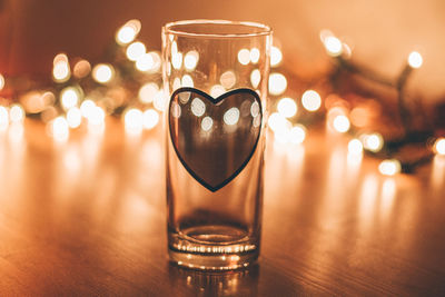 Close-up of wineglass on table