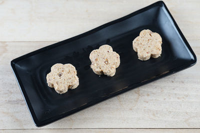 High angle view of cookies on table