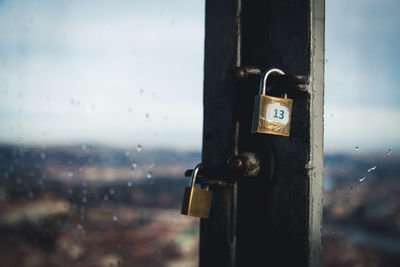 Close-up of padlock on doors