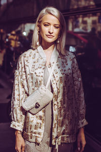 Young woman standing outdoors