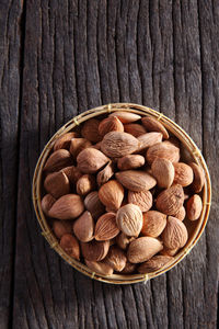 Directly above shot of almonds in container on table