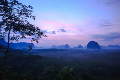 Scenic view of landscape against sky during sunset